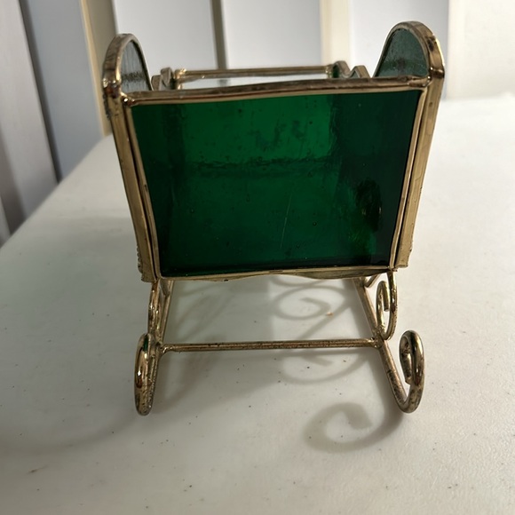Green stained glass sled with gold metal and side leaf design